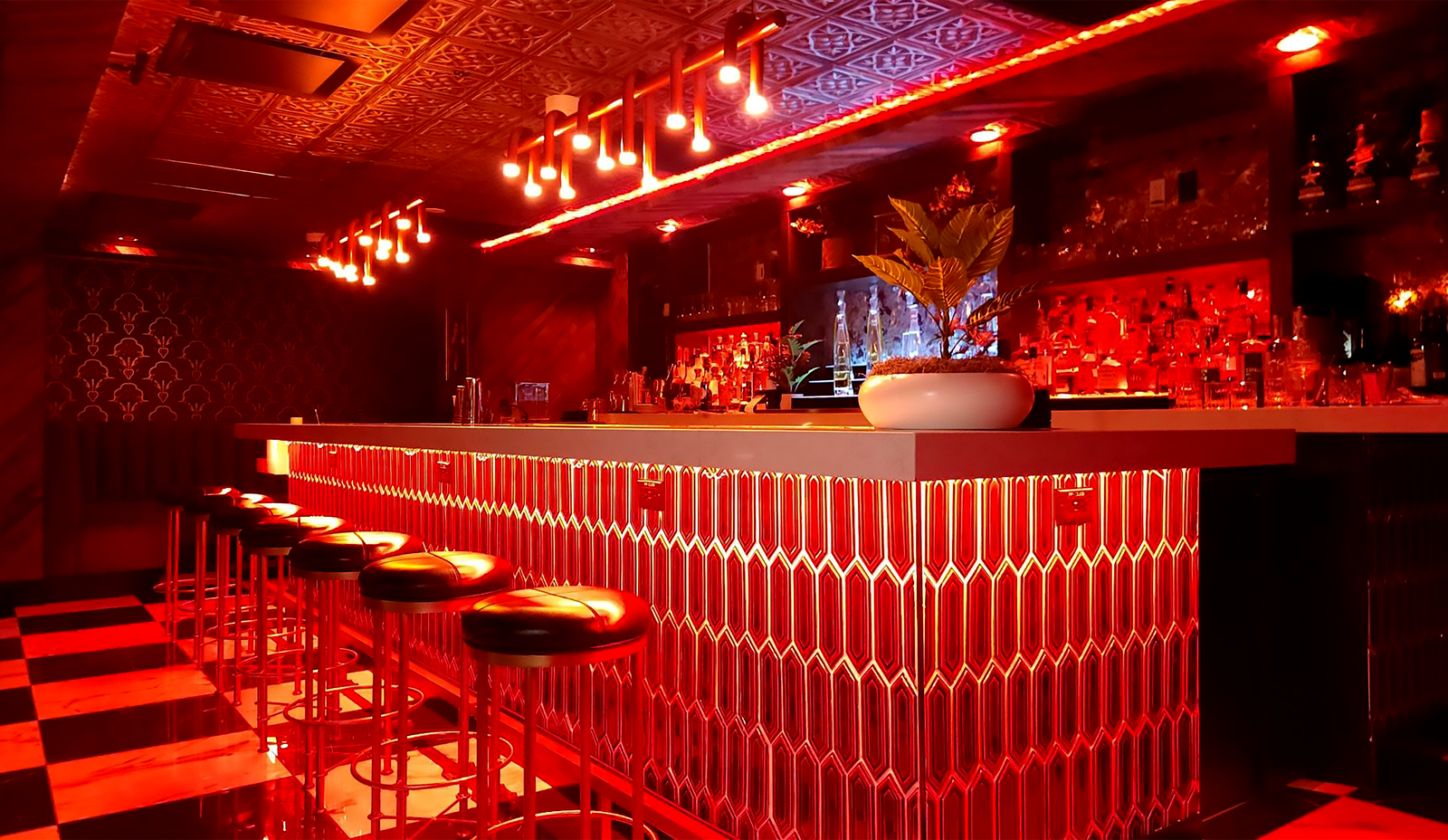 ROJO ROOM cocktail lounge bar interior with red lighting